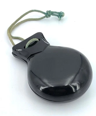 Castagnettes en bakelite noire brillante, made in England, de la marque ACME - Photo 1/4