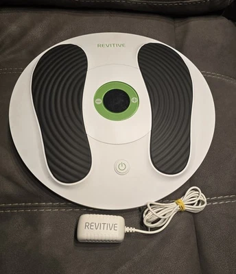 Amplificador de circulación Revitive Essential para pies con adaptador de corriente. Funciona  Foto 1 de 2