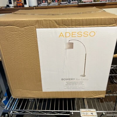 Adesso Home Bowery 73.5"H Antique Brass Arc Floor Lamp with Off-White Textured - Image 1 of 4