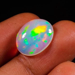 Piedra cabujón forma ovalada ópalo de fuego etíope natural de fabulosa calidad 4,25 quilates - Imagen 1 de 6
