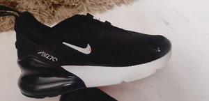 Size 2 Nike Sneaker Shoes. Only Wear few Times.  No Laces But in good condition - Picture 1 of 3