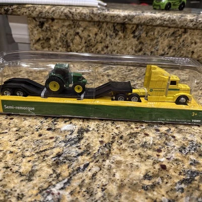 John Deere 1:64 Yellow Hauler Semi Set with Semi Truck, Trailer & Farm Tractor - Image 1 of 4