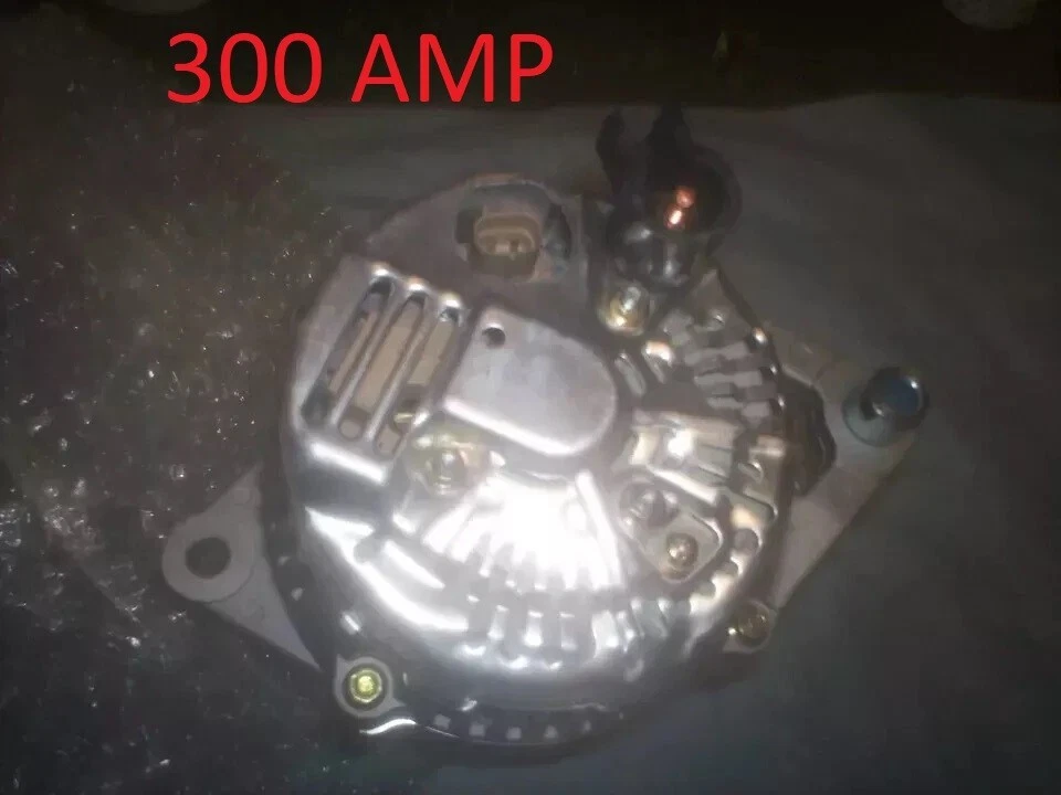 Jeep Cherokee 2001 4,0 L 300 amplificador alto caja grande alternador Chrysler polea pequeña Foto 1 de 3