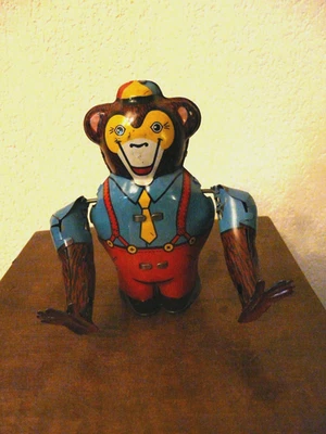 ANCIEN JOUET MECANIQUE EN TOLE LITHO-SINGE ACROBATE-JOUSTRA-CIRQUE-ANNEE 1950 - Photo 1/4