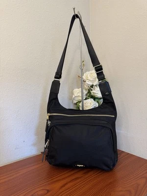  Bolso Bandolera Tumi Voyageur ” Nylon - NEGRO con DORADO Foto 1 de 4