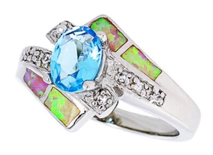 Fine Women Silver Rhodium Plated Pink Opal Ring Oval Shape Light Blue 13mm - Picture 1 of 1