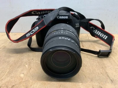 Canon EOS 4000D w/ 70-300mm Sigma Lens - No Charger (E10039574) - Image 1 of 4