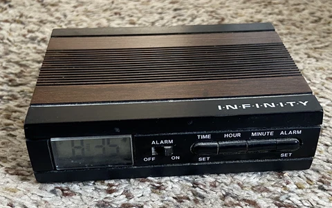 Vintage INFINITY Brown Wood Tone 1970's Small/Mini Travel Alarm Clack - Working! Cover