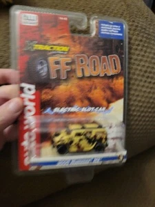 Auto World Xtraction Off Road 2005 Hummer H2 Camo HO Scale Slot Car New - Picture 1 of 4