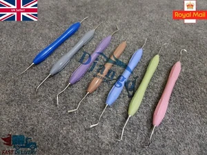 Juego de 7 instrumentos de relleno y restauración dental compuestos - Imagen 1 de 10