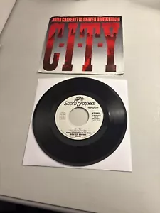 JOHN CAFFERTY AND THE BEAVER BROWN BAND CITY PROMO 7" VINYL 45 RPM W/ PS VG+ - Picture 1 of 2