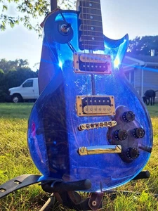 Guitarra Eléctrica Grand Clear Blue Lucite - ¡Grita con Sustain! - Imagen 1 de 9