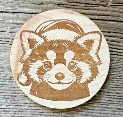 Wooden Nickel Geocoin-Christmas Racoon - Image 1 of 2