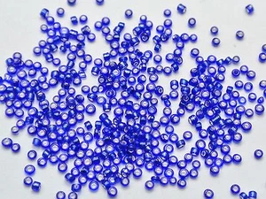 10000 mini perline di vetro 1,5 mm (12/0) foderate argento blu reale + scatola portaoggetti - Foto 1 di 2