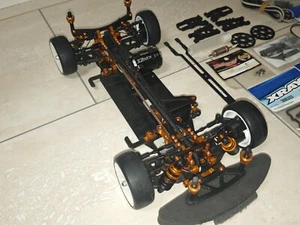 Team Xray T4 mit Motor, Servo, Reifen, + Ersatzteilspender Chassis, Tuningteile - Bild 1 von 12