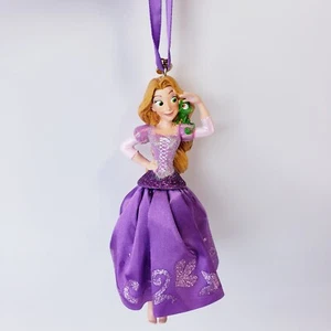 Disney Store Árbol de Navidad Adorno de vacaciones Rapunzel Cuaderno de bocetos Enredado 2015 - Imagen 1 de 4