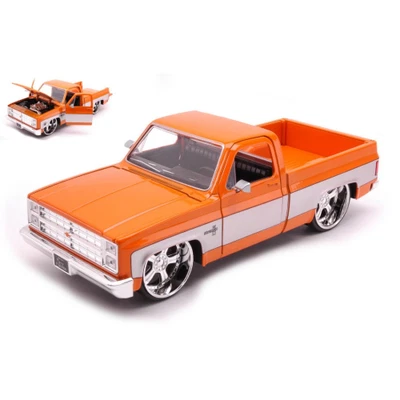 CHEVROLET C-10 PICK UP 1985 ORANGE/GREY 1:24 Jada Toys Movie Modellino Nuovo - Immagine 1 di 3