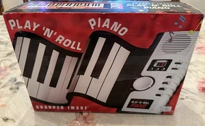 Play N' Roll Piano By Sharper Image - Sealed & Unopened - Picture 1 of 2