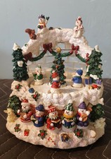 The San Francisco Music Box Company Snowmen Carousel
