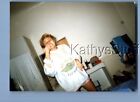 FOUND COLOR PHOTO U+5111 PRETTY WOMAN POSED WITH FINGER ON NOSE