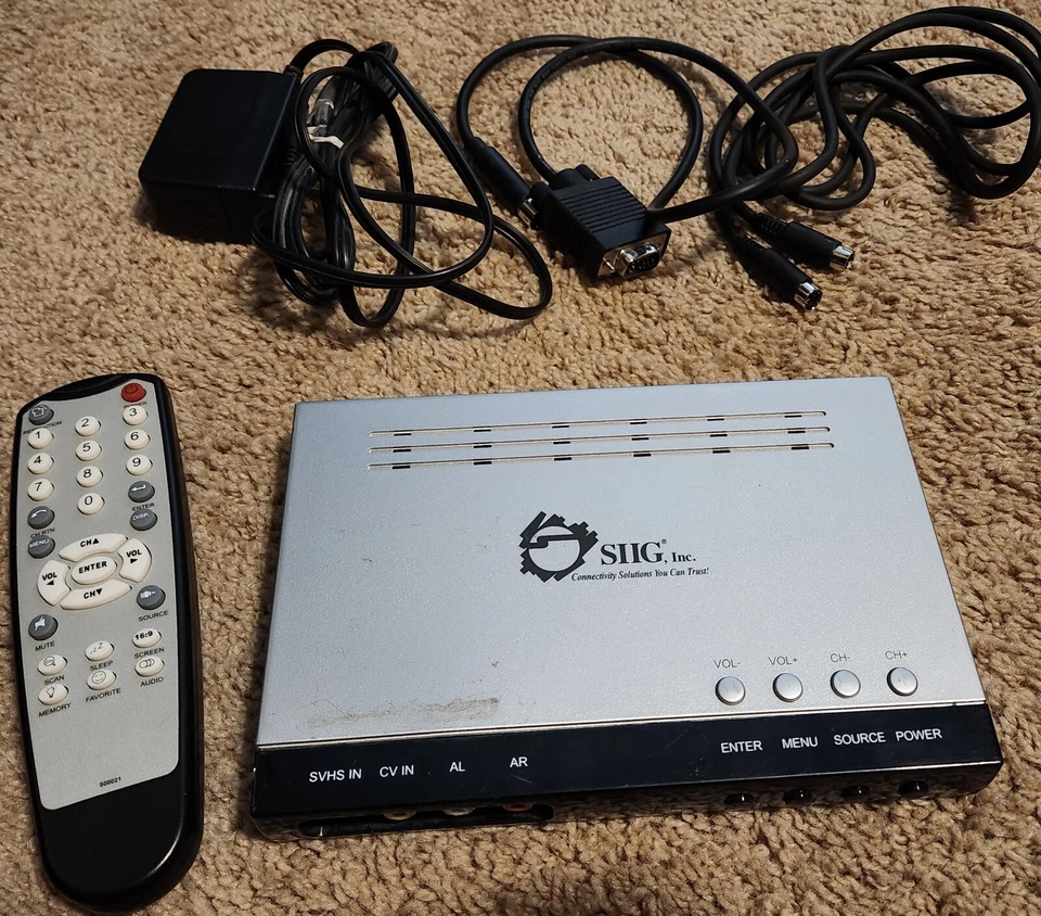 SIIG AVTuner Plus CE-AV1012-S1 w/ power adapter and remote control - Image 1 of 1