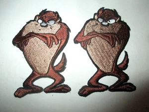 MENGE 23 NEUE LOONEY TUNES TAZ TAZMANISCHE GEKREUZTE ARME 3" AUFBÜGLER PATCHES COOL - Bild 1 von 12