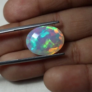 Tablero de ajedrez 8 quilates 16,7x13 mm natural AAA multi fuego ópalo etíope corte ovalado - Imagen 1 de 14