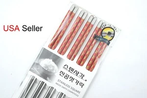 Juego de regalo 10 palillos de acero inoxidable con impresiones en color dorado y rojo (5 pares)  - Imagen 1 de 4