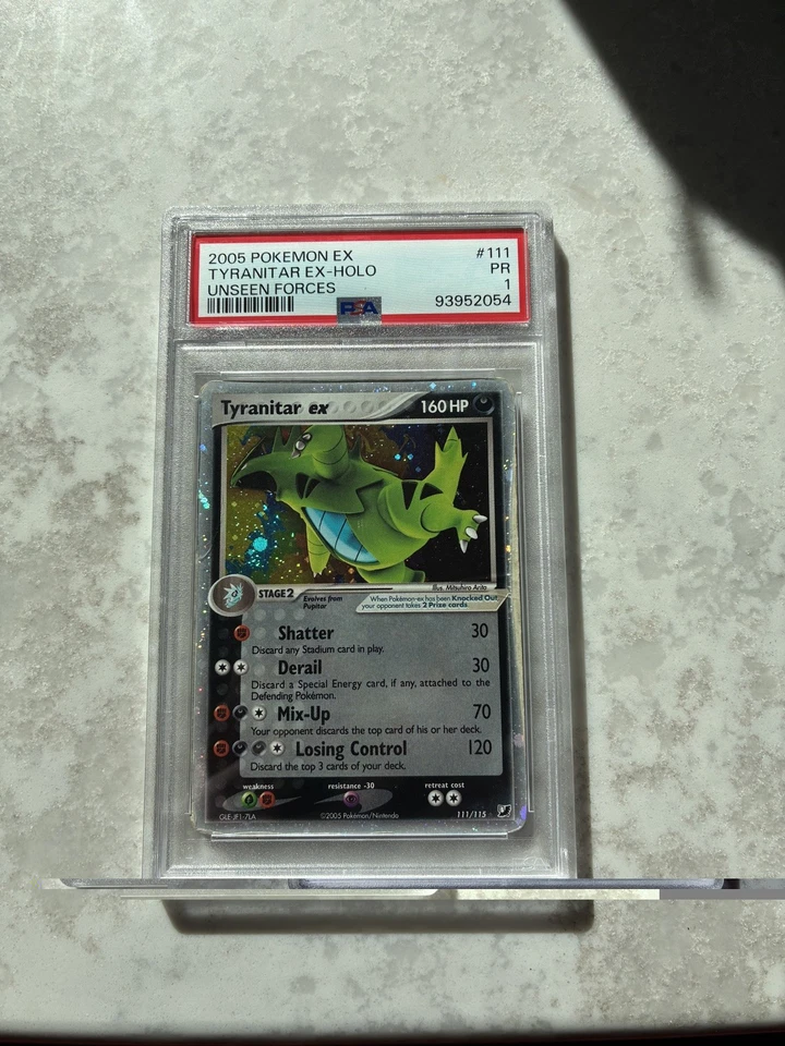 2005 POKEMON EX UNSEEN FORCES #111 TYRANITAR EX-HOLO PSA 1 - Image 1 of 2