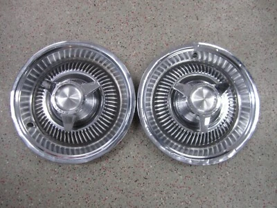 Dos (2) Tapacubos giratorios Pontiac Tempest GTO 1964-1965 14" OEM Foto 1 de 4