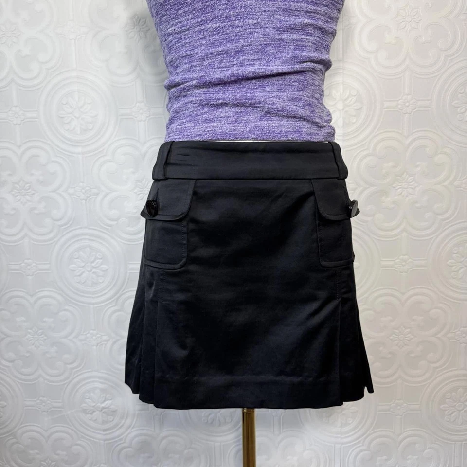 Minifalda vintage Bebe para mujer 8 bolsillos plisados satinados negros sirena de oficina Y2K Foto 1 de 4