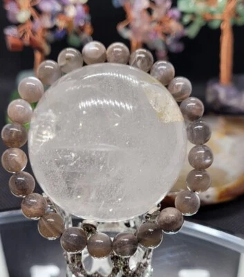 Pulsera de cristal de piedra solar esqueleto negro de 7 mm  Foto 1 de 4