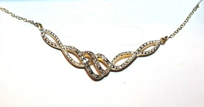 Collar Espira Celebración del Amor 0,15 CTTW Diamante Oro Sobre Plata de Ley Foto 1 de 4