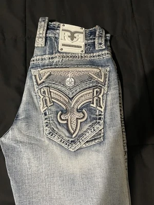 Pantalones de mezclilla elásticos ajustados azul corte bootcut Hansel Rock Revival para hombre talla 28x30 Foto 1 de 4