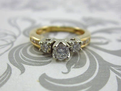 ANILLO DE DIAMANTES DE TRES PIEDRAS DE ORO BICOLOR 14K PARA DAMA 0,47 CT. VALORADO Foto 1 de 4