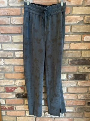 Pantalón de chándal desigual verde azulado negro floral pierna ancha usado en excelente estado L grande Foto 1 de 4