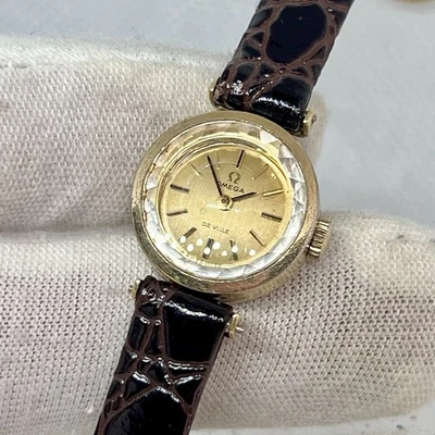 Omega De Ville vintage para mujer enchapado en oro cristal biselado funcionando bien  Foto 1 de 4