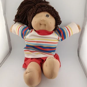 Toppa cavolo vintage 1984 bambino capelli castani occhi marroni danneggiata - Foto 1 di 6