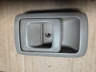 Manija de puerta interior lateral izquierdo Toyota 4Runner 1998-2002 marrón OEM Foto 1 de 2