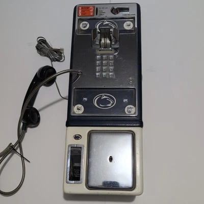 Teléfono de pago vintage años 80, logotipo de Penn State Foto 1 de 4