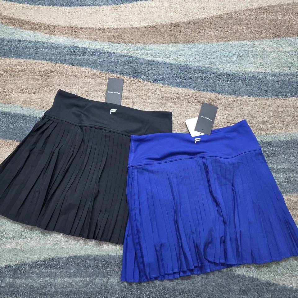 Lote de 2 Skorts Plisados para Mujer Fabletics Medianos Negros y Azules Nuevos con Etiquetas Tenis Golf Foto 1 de 4