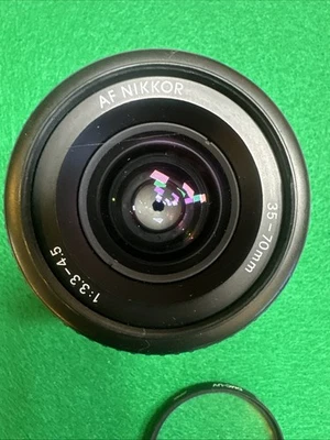 Lente Nikon AF Nikkor 35-70 mm f/3,3-4,5 - Para piezas o reparación Foto 1 de 4