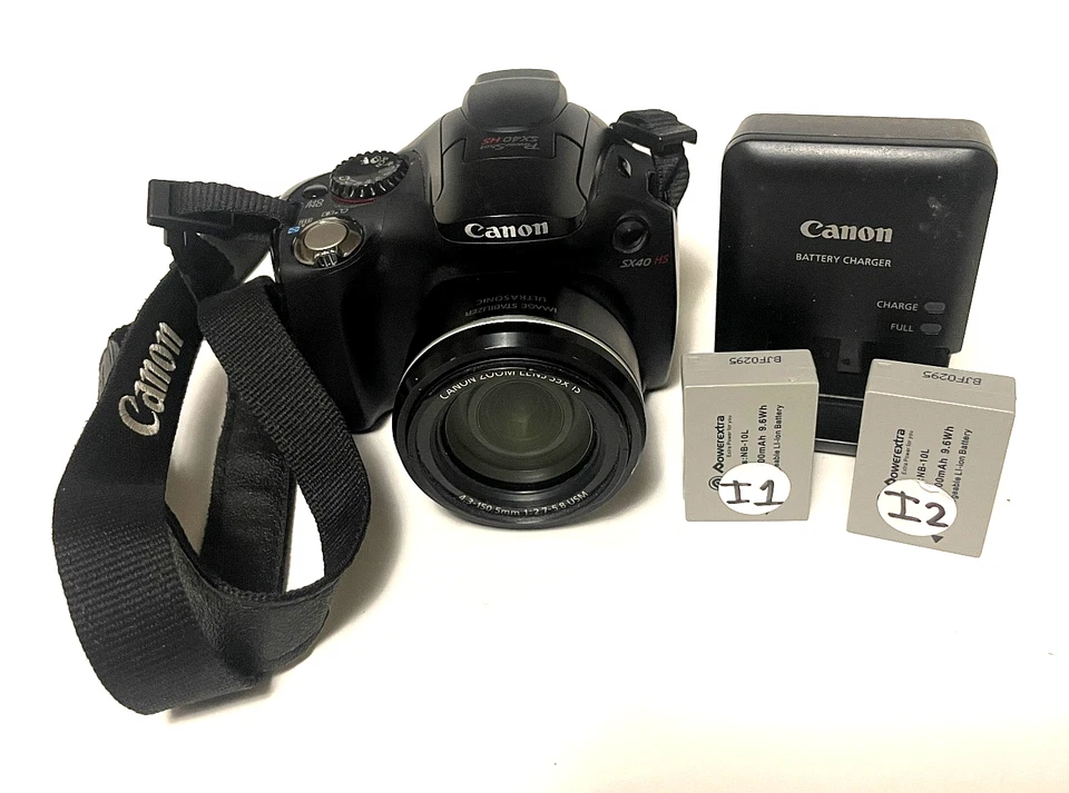 Canon PowerShot SX40 HS 12.1MP 35x Zoom Digital Camera w/ 2 Batteries + Charger - Image 1 of 4