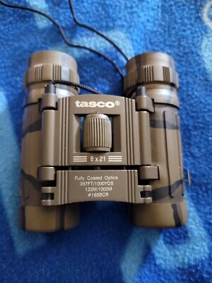 TASCO 8X21 FULLY COATED OPTICS 392 FT/ 1000 YDS #165BCR CAMO BINOCULARS - Image 1 of 3