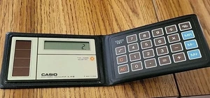 Vintage Casio Japanese SL-80 (A) Solar Folding Mini Electronic Calculator Rare - Picture 1 of 4