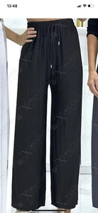 WOMENS RIBBED TEXTURED FLARED TROUSERS WIDE LEG CULOTTES PLEATED PALAZZO BOTTOMS - Picture 1 of 5