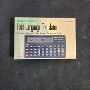 Vintage Radio Shack LCD Four Language Pocket Translator Spanish German French - Picture 1 of 10