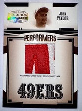 John Taylor 2005 Donruss Gridiron Gear Performers Name Plate Patch #4/8