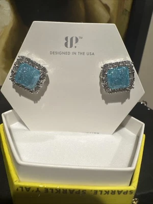 Pendientes Bomb Party, Topacio Azul Cristal de Hielo/Rodio, Ecos de Secretos Ininterrumpidos Foto 1 de 3