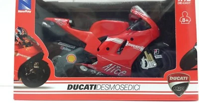 Casey Stoner. Ducati Desmosedici. 2009  1/12 Newray - Image 1 of 4